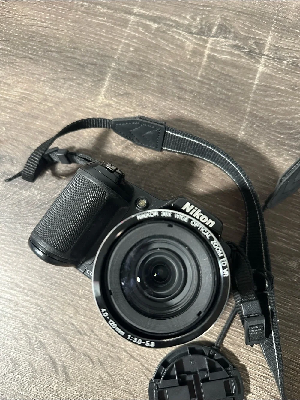 Nikon Black Compact Bridge Camera with Detachable Lens Cap